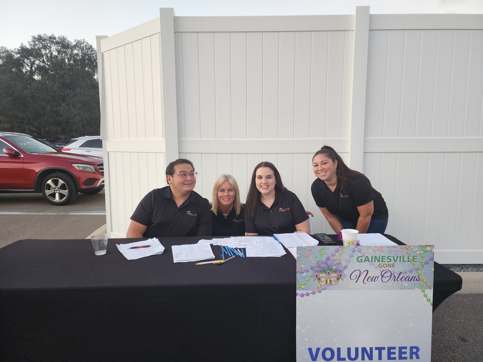 Radiant team members volunteering for check in at Gainesville Gone New Orleans