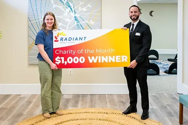 Charity of the Month check being presented to Healing For All