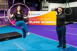 Charity of the Month check being presented to Gainesville Circus Center