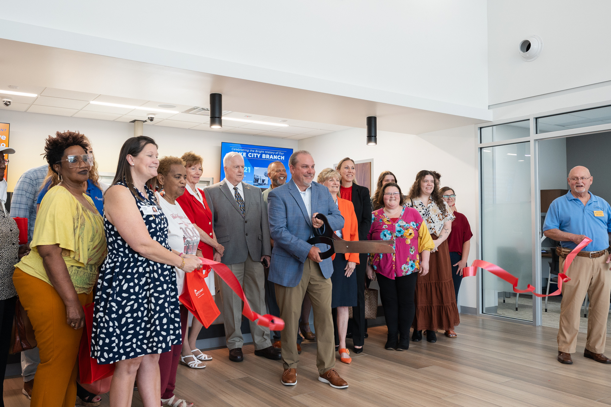 Radiant Credit Union dedication ceremony showing ribbon cutting