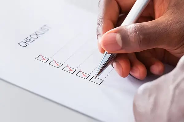 Close-up of a Radiant Credit Union mortgage application checklist being filled out to support long-term financial goals.