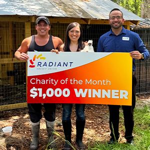 presenting August Charity of the month check