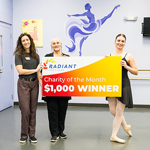 presenting November Charity of the Month check - Sun Country Dance Theatre