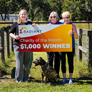 presenting September Charity of the Month check - Fix Them All