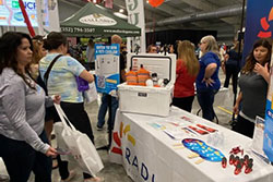 employees talking with visitors at the outdoor expo ocala