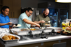 employees enjoying tacos