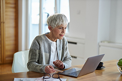 Women reading what is on computer screen