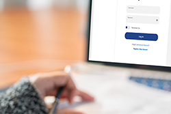 cell phone using mobile deposit to deposit check