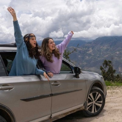 two women excited to arrive at their destination.